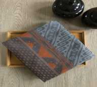 KAIN TENUN MOTIF TOLAKI